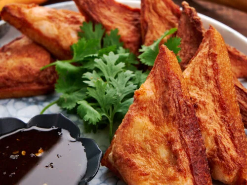 Bar Chinois signature dishes Shrimp Toast, Duck Fried Rice, Scallion Pancake with Bone Marrow, French Onion Soup Dumplings